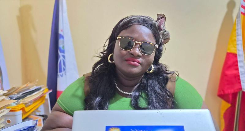 Bong Land Administer in her office 